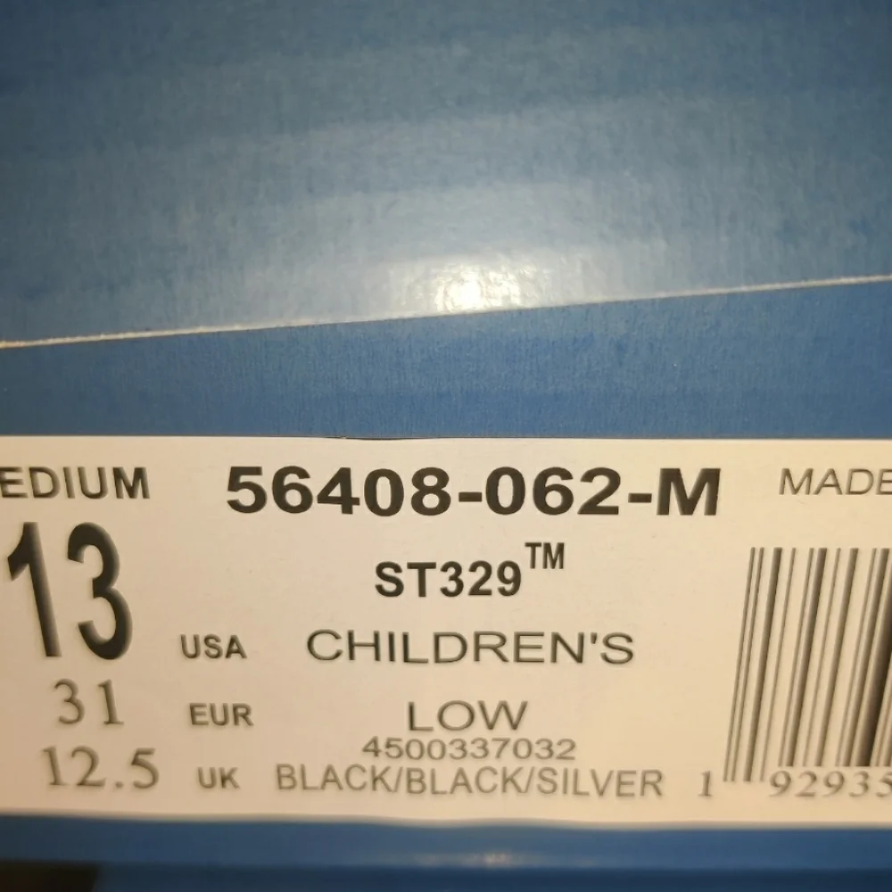 K-Swiss Kids' ST329 Sneaker Varsity Low Color: Black